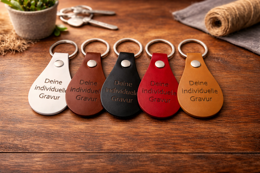 Personalisierter PU-Leder-Schlüsselanhänger mit individueller Gravur in verschiedenen Designs, langlebig und stilvoll.
